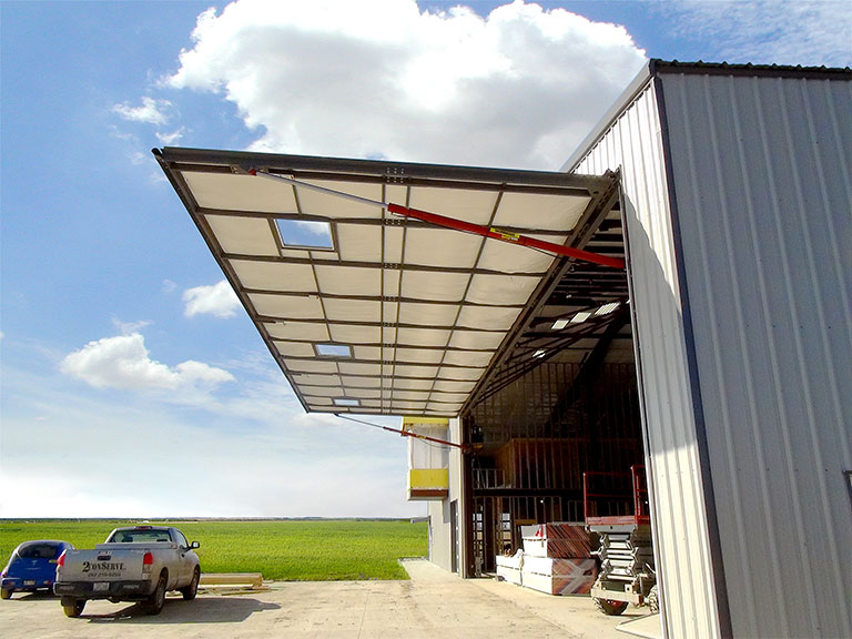 hydraulic door on a machine shed on a farm